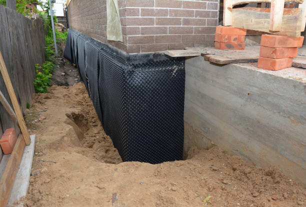 SJ Waterproofing Pros technician performing targeted Interior Drainage System assessment in Hibernia, NJ